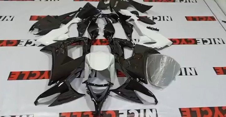 The Kawasaki ZX10R White/Black fairings are a set of body panels designed for...